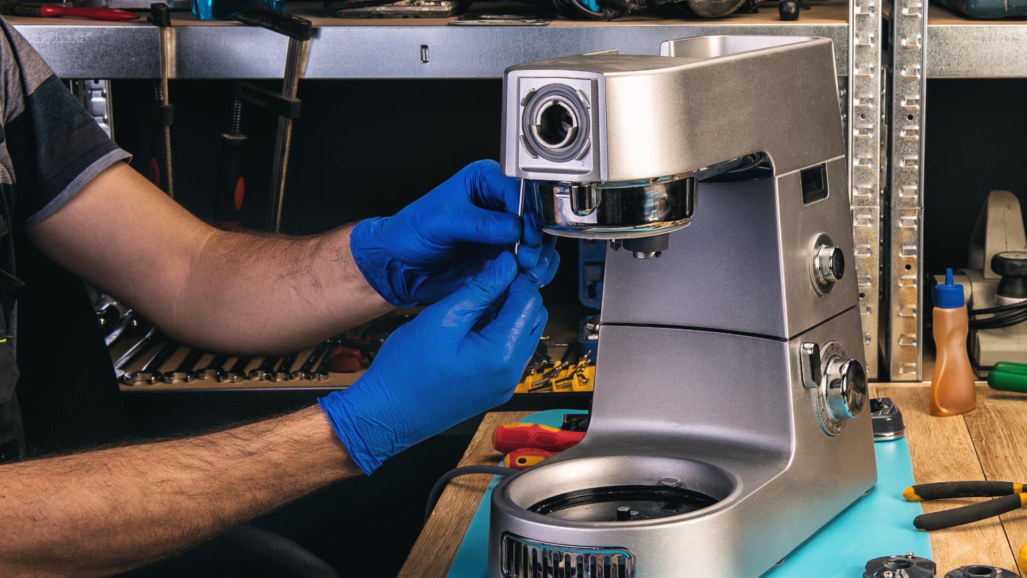 Appliance technician installing a dishwasher