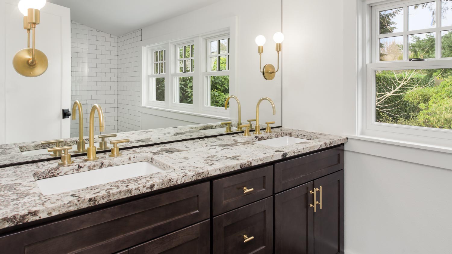 Bathroom vanity with two sinks and granite countertop