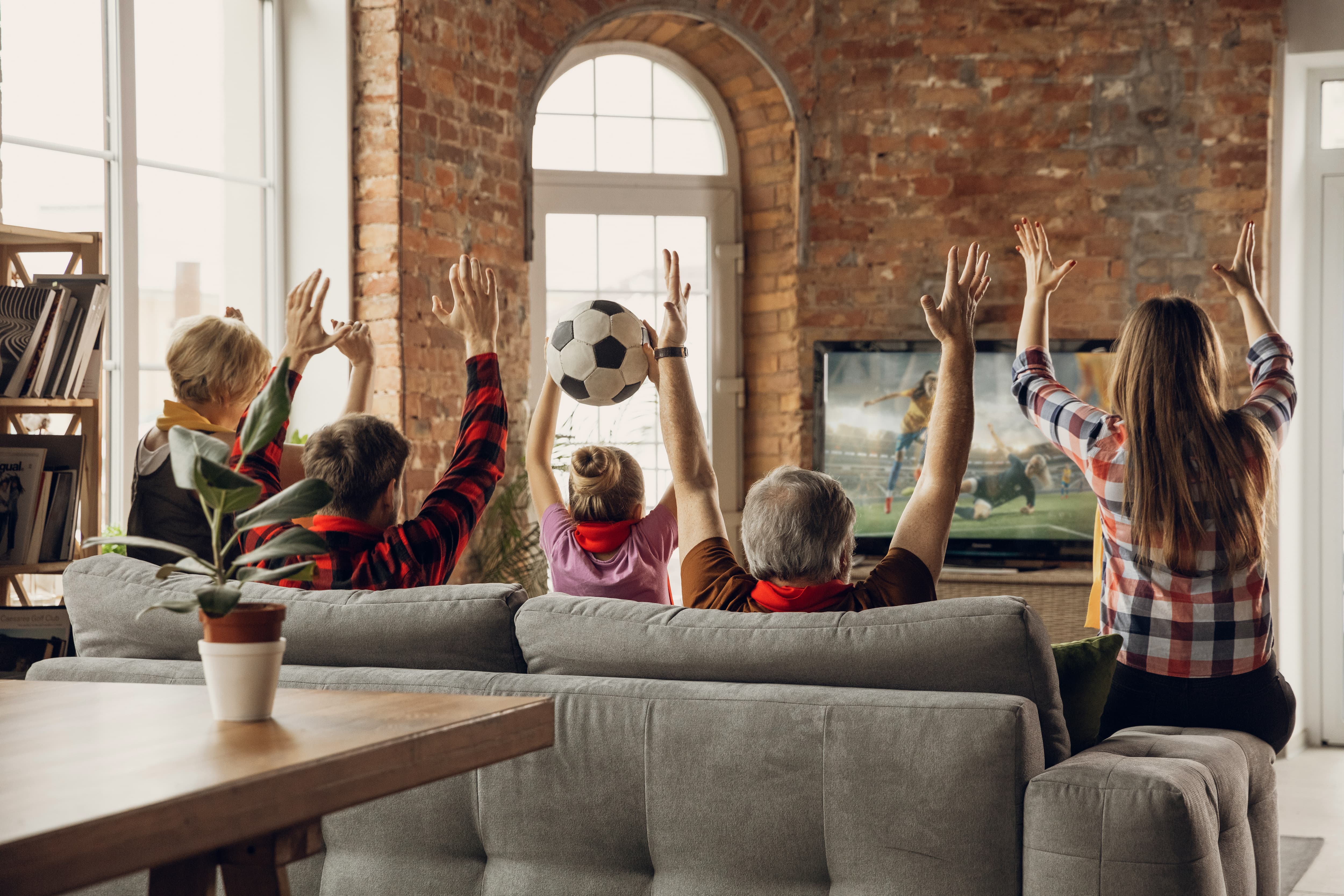 Group of friends watching a soccer game