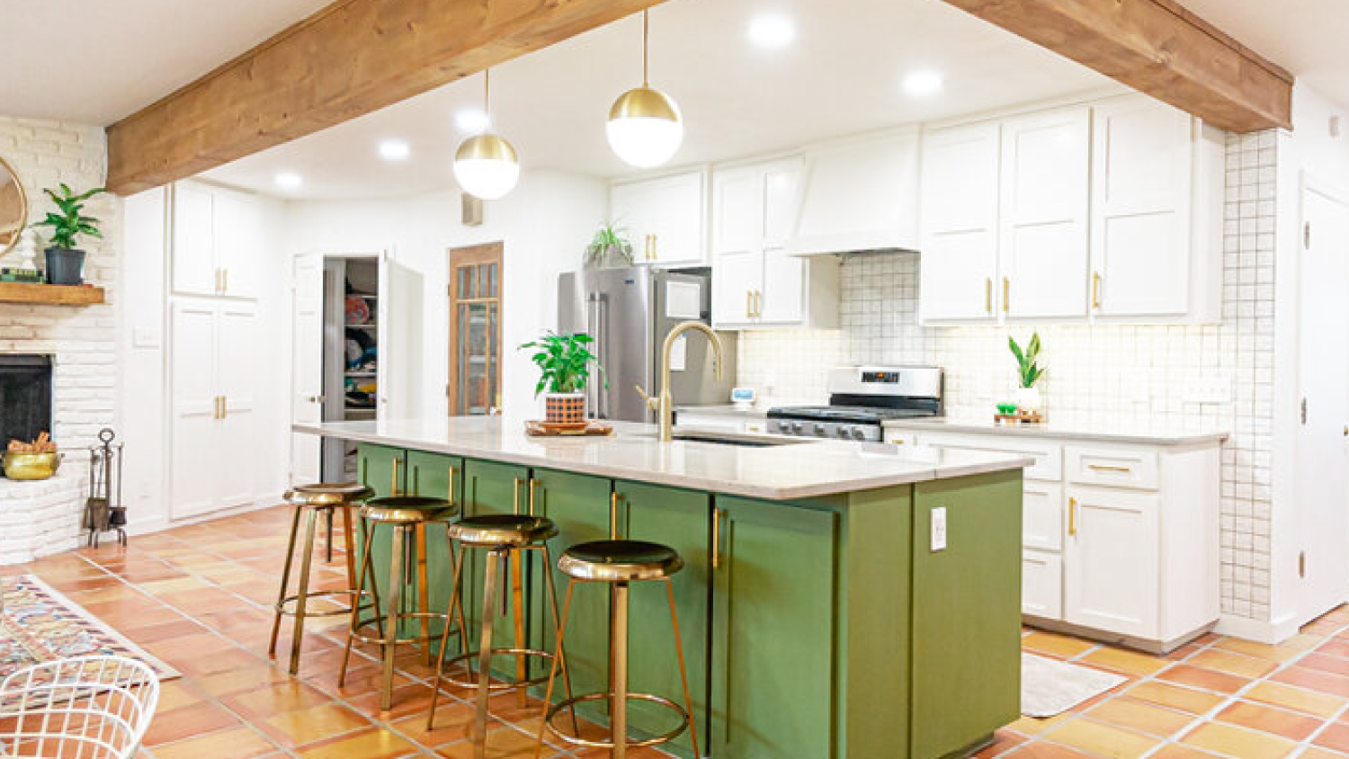 Interior of a modern white and green kitchen