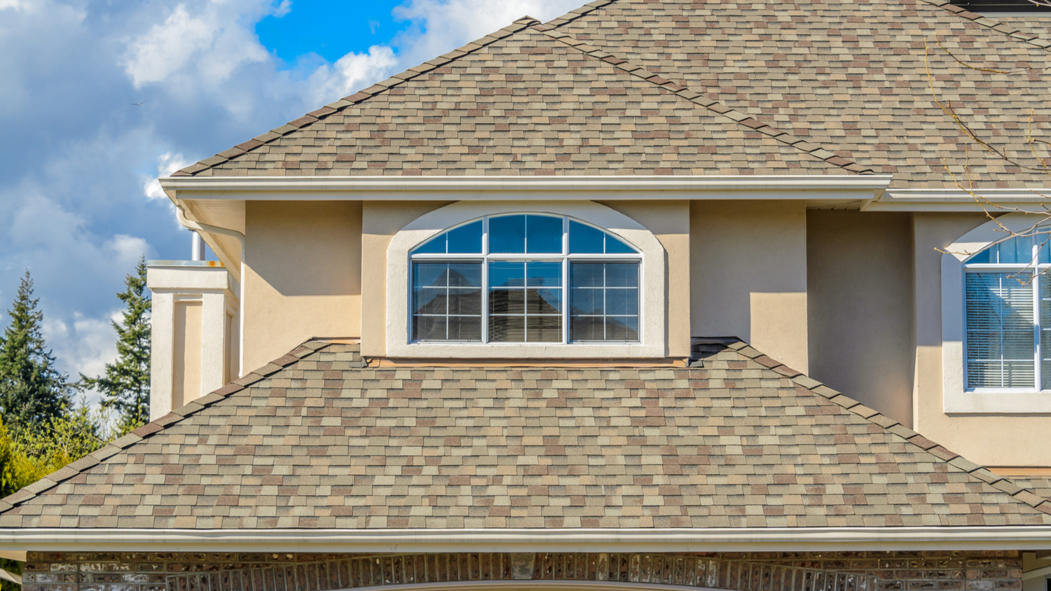 The roof of the house with large window