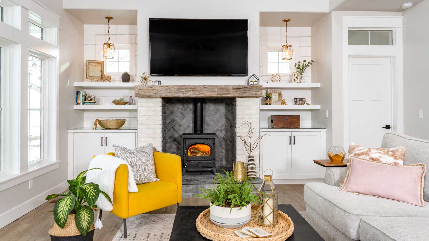 Living room with fireplace and barn wood mantle