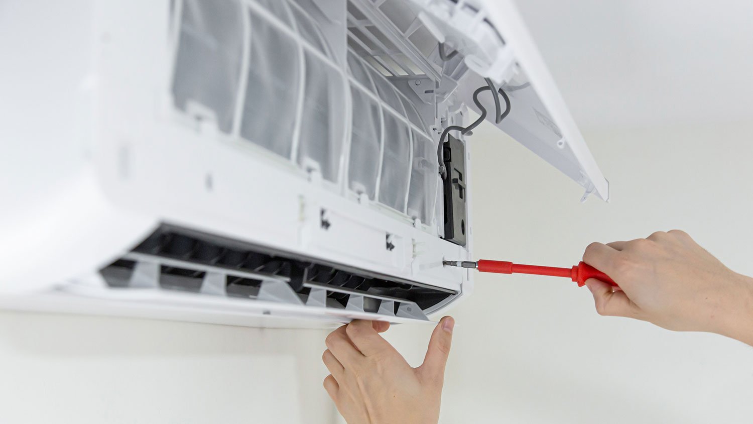 Removing ac panel with a screwdriver