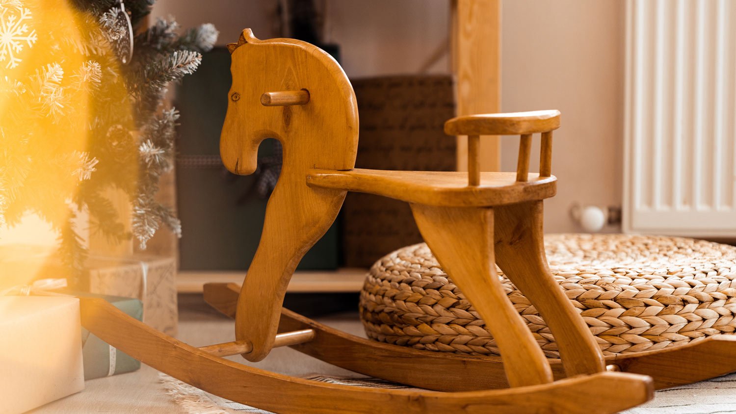 An antique wooden riding horse toy