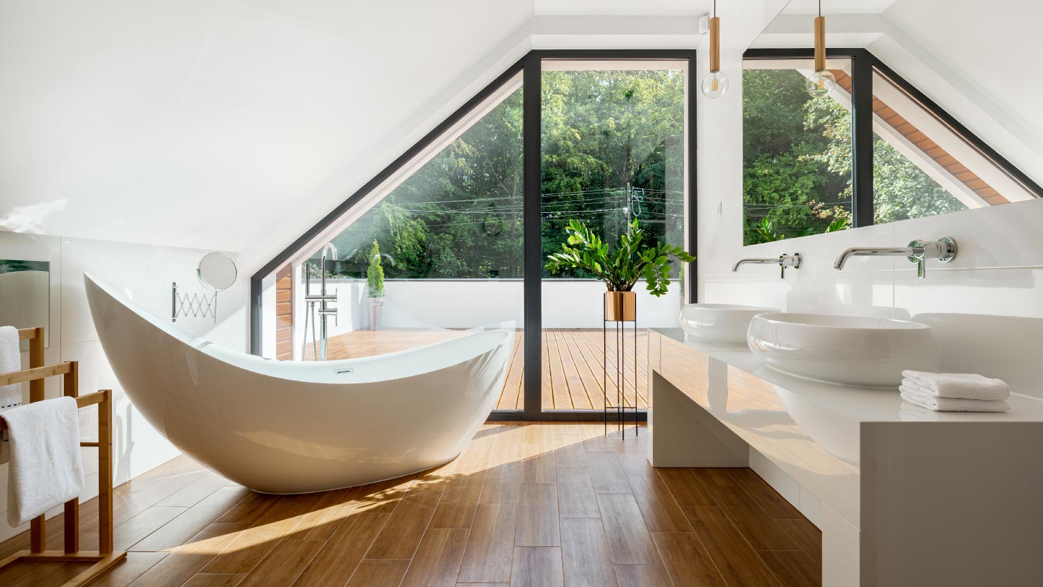 An elegant attic bathroom with bathtub