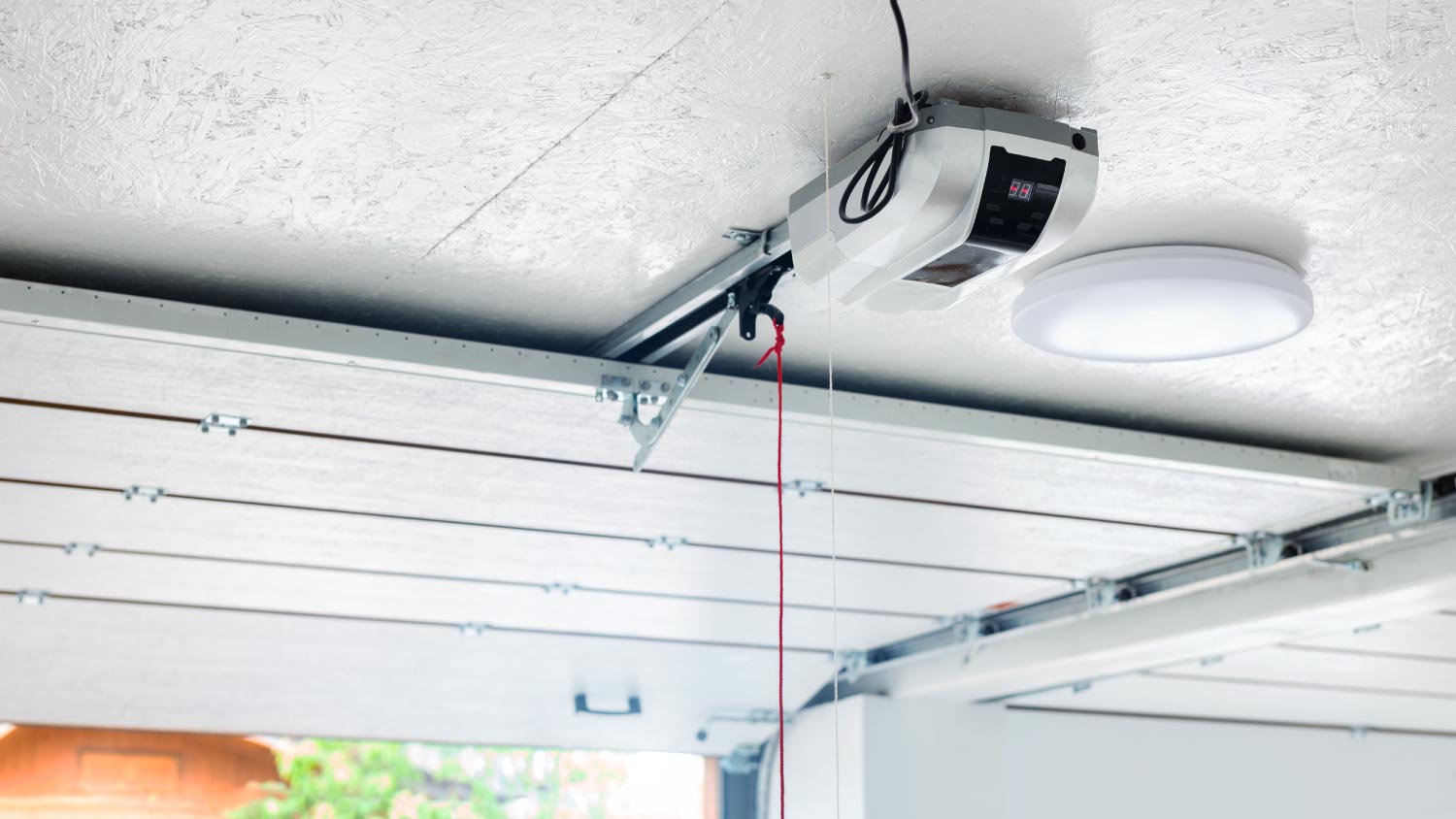 An automatic garage door opener