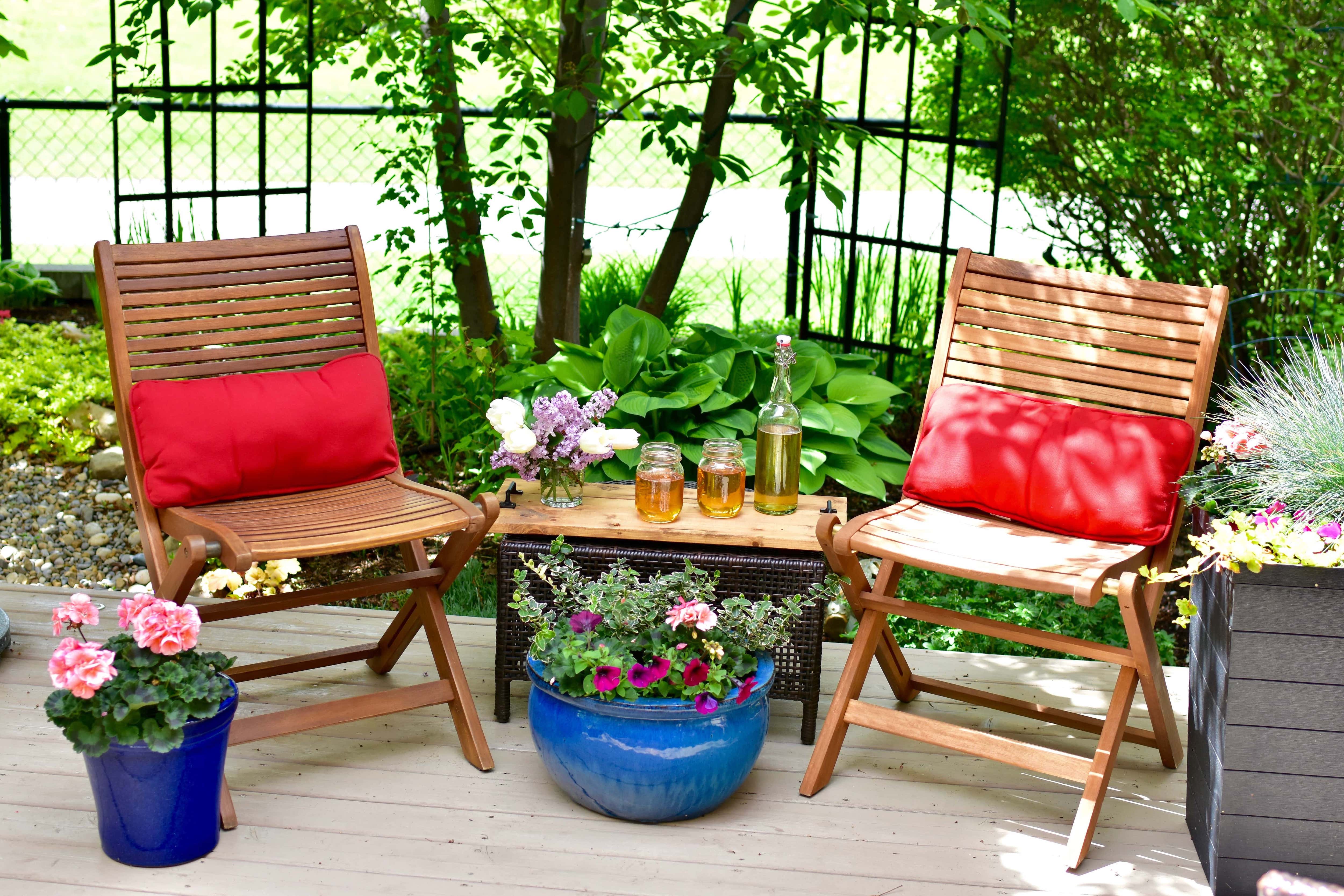 Outdoor patio chairs and table in garden