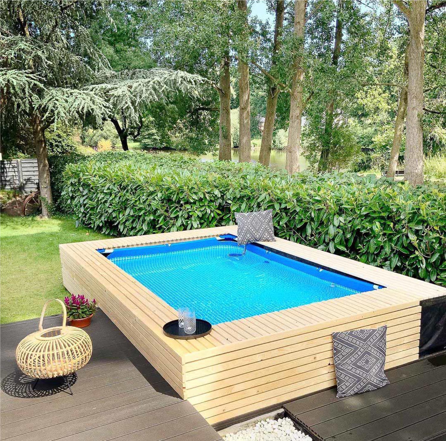A backyard with a small pool