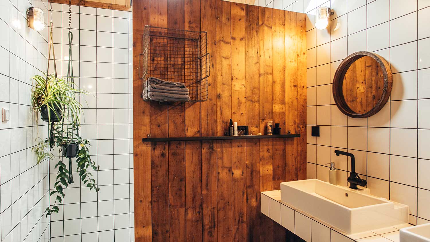 Barn wood accent wall in the bathroom