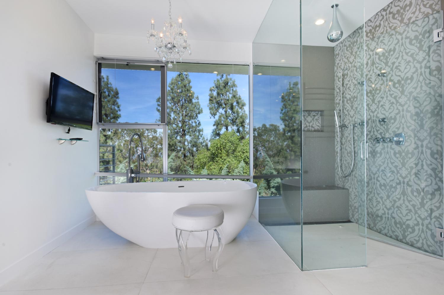 A bathroom with a large shower