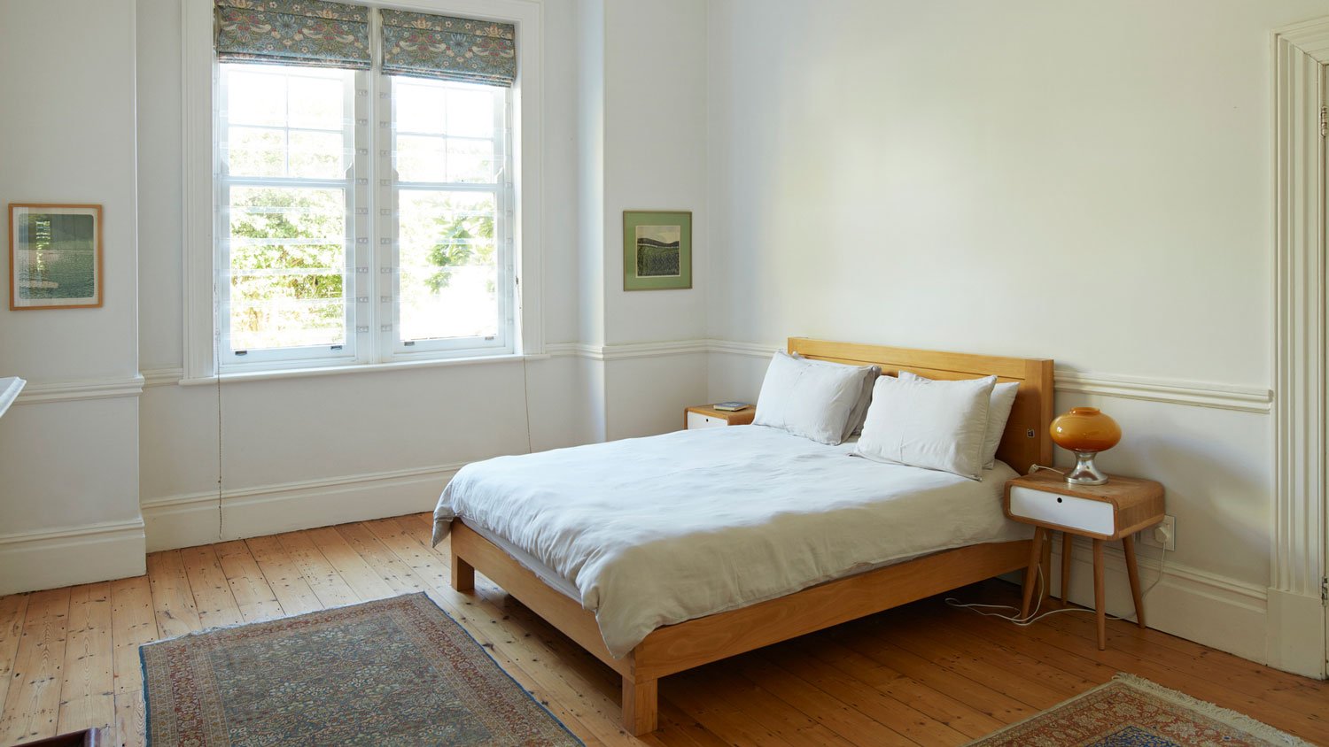 A bedroom with a pocket window