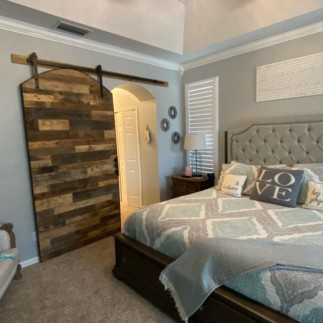 Sliding barn door made with reclaimed barn wood