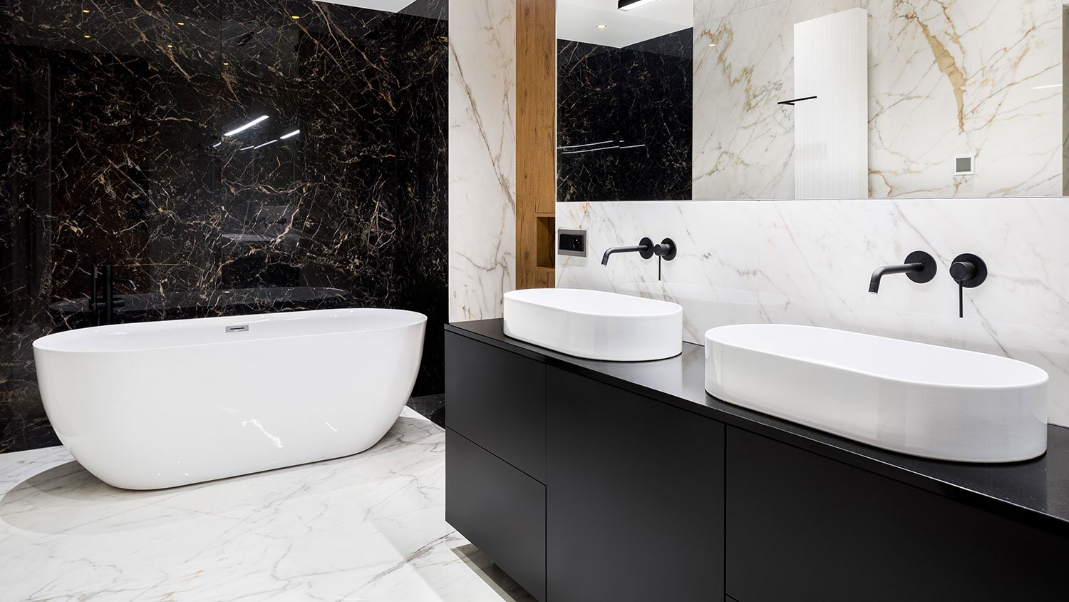 Luxury bathroom with black marble wall