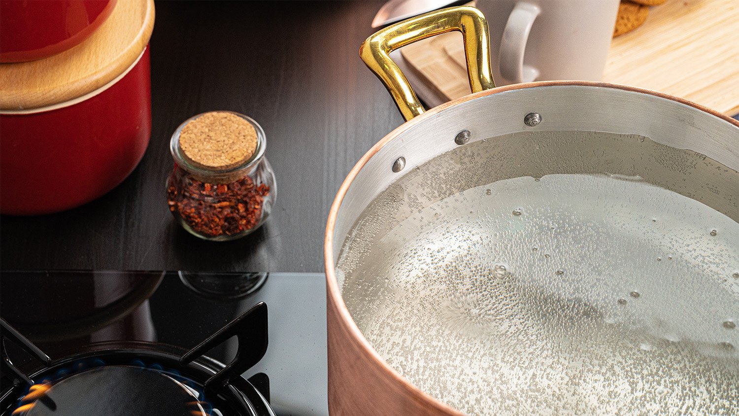 pot of boiling water on stove 