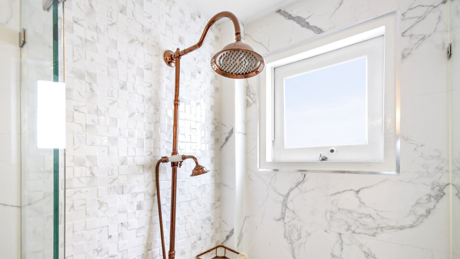 A brass vintage shower head