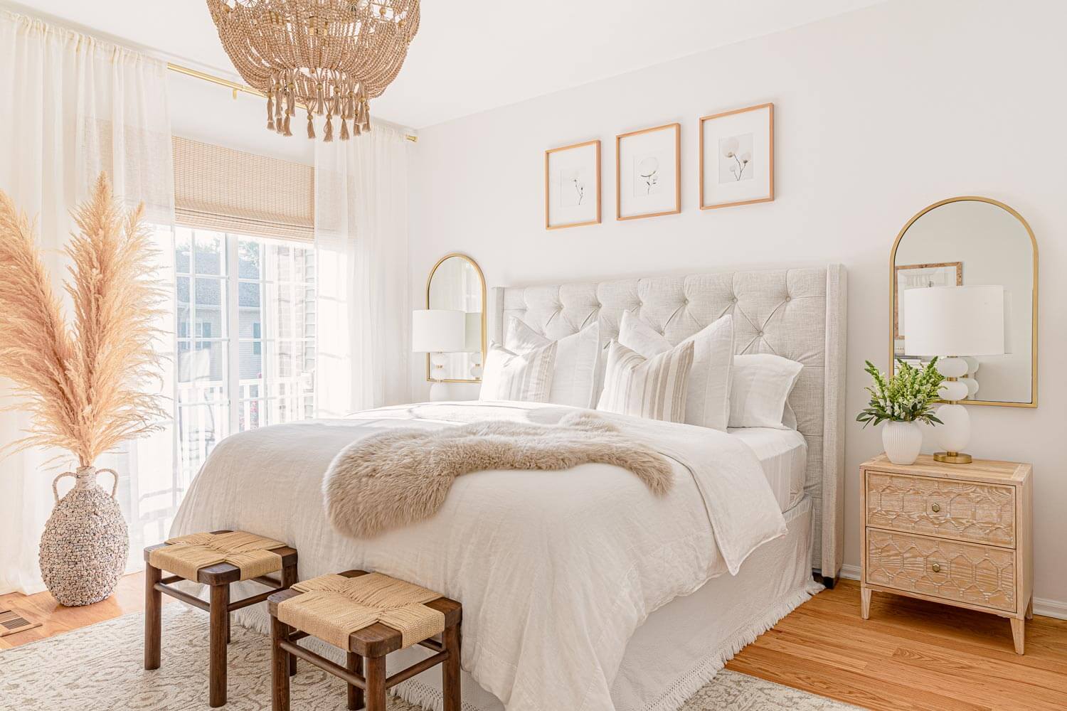 A minimalist bedroom with natural wood floors