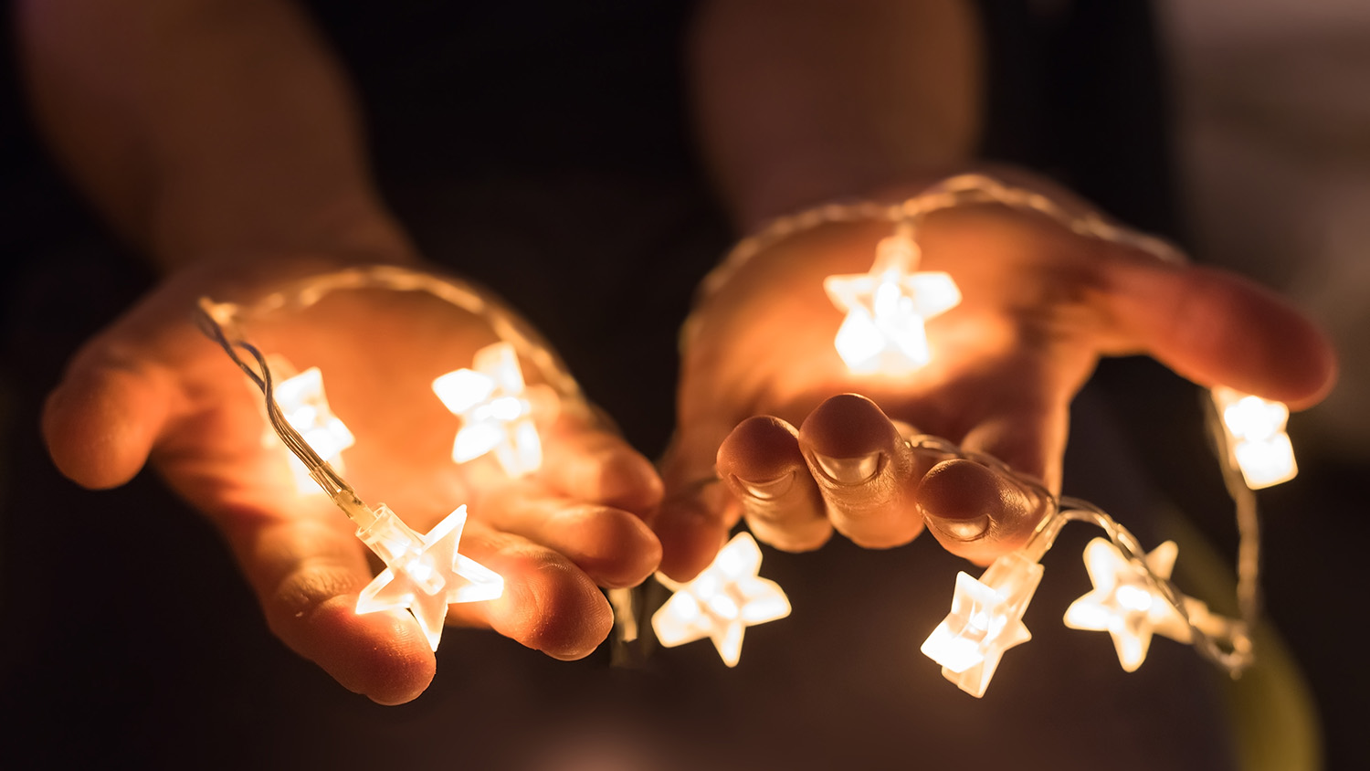 lights in someone's hands