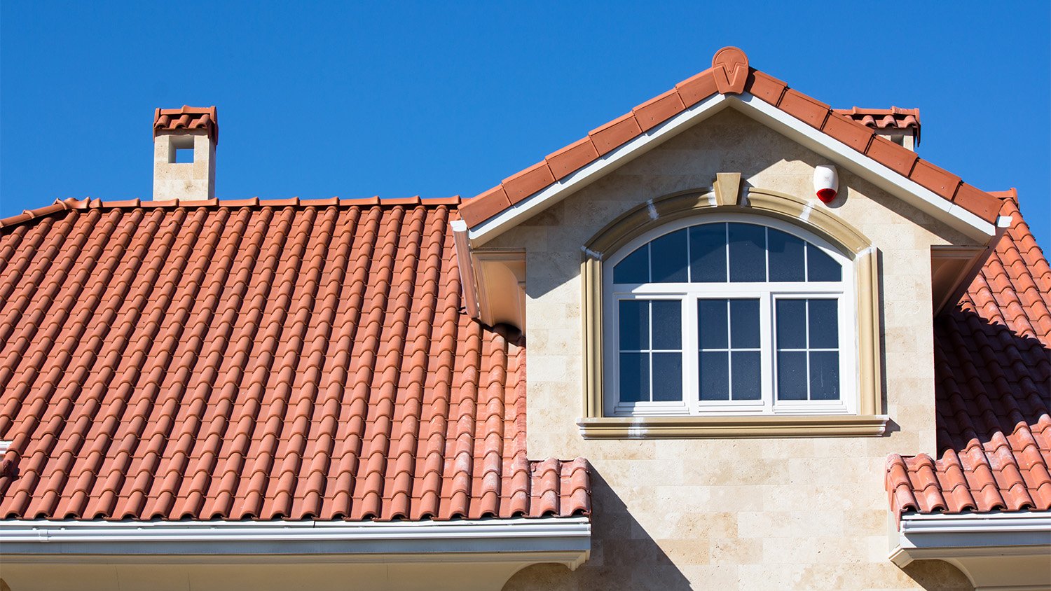 Ceramic tiled roof on house