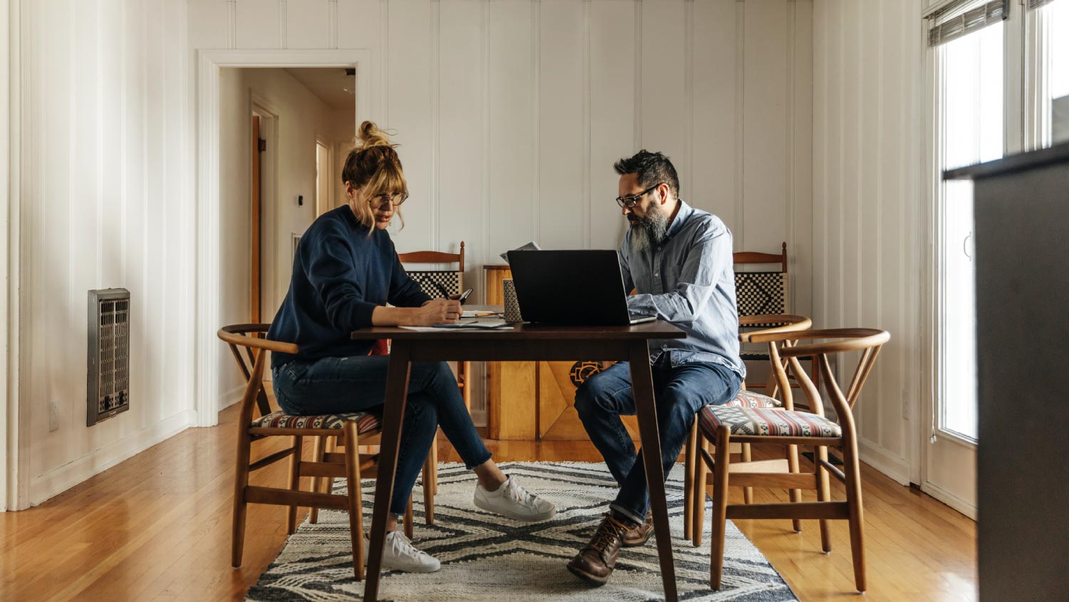 A couple paying bills