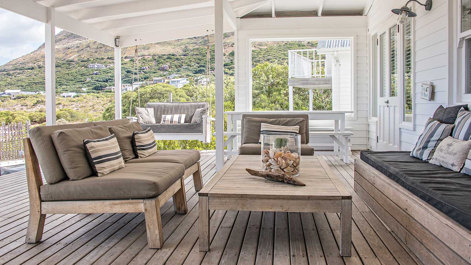 Covered deck with modern outdoor furniture