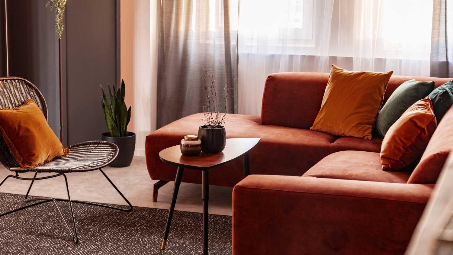 cozy warm living room with cushions and chairs