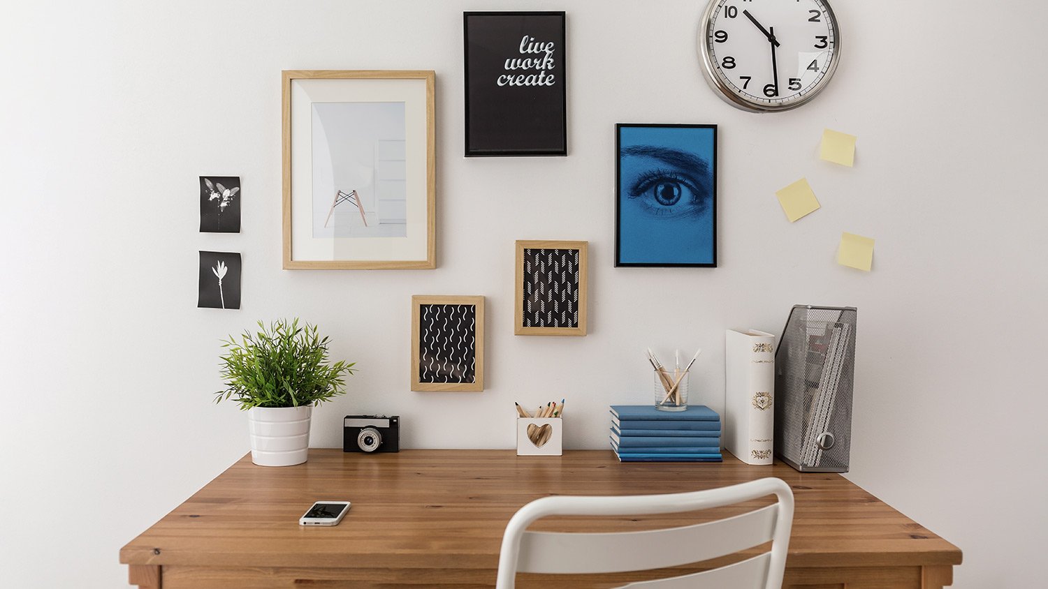 wooden desk gallery wall art white desk clock