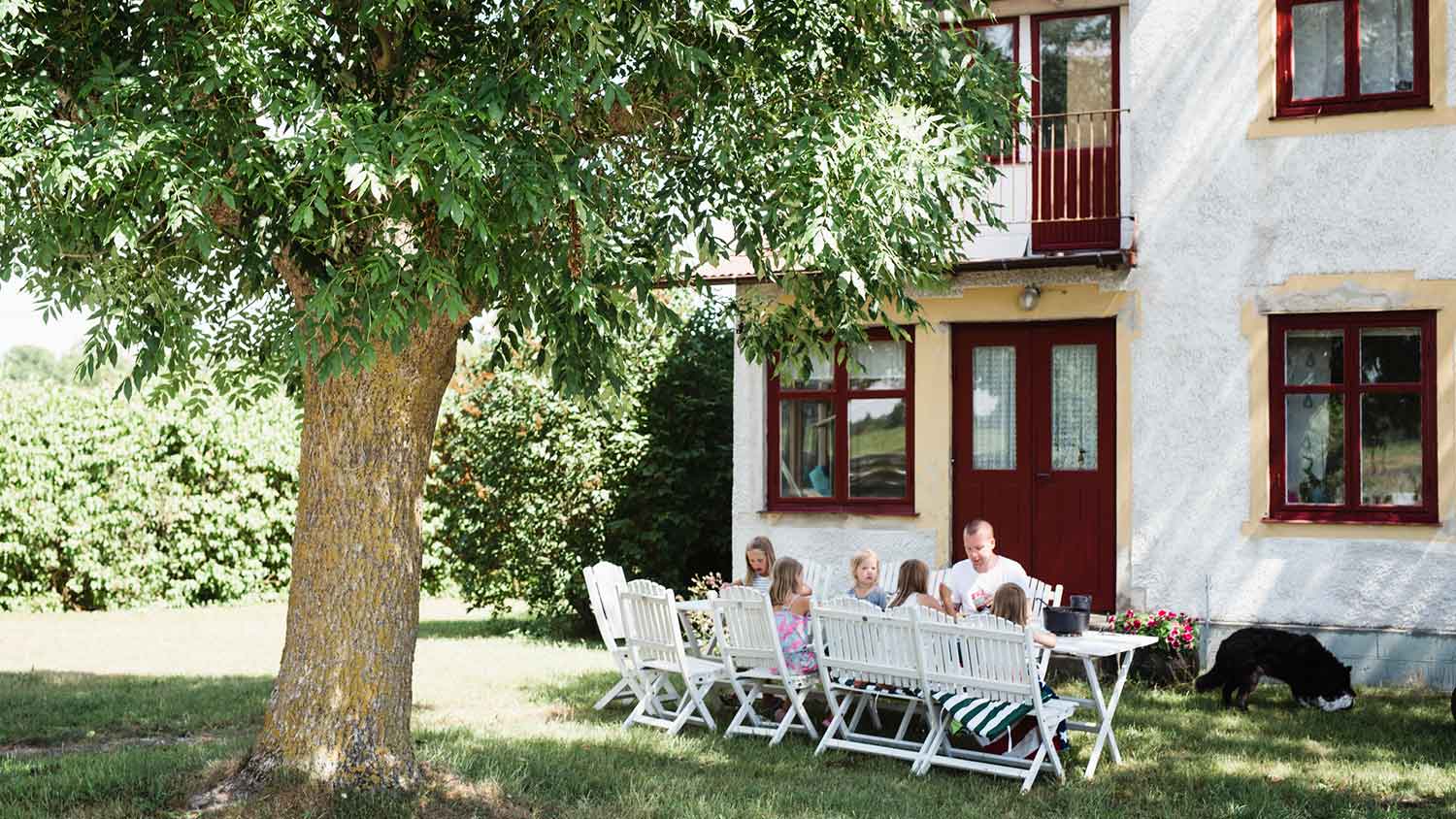  Family having brunch in the garden