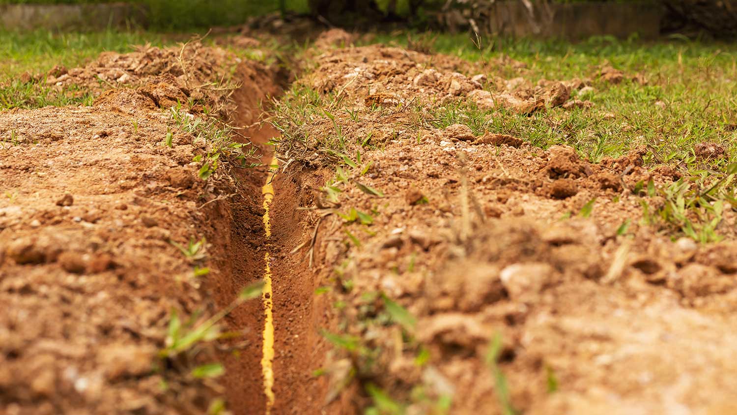 Electric pipe line buried in trench