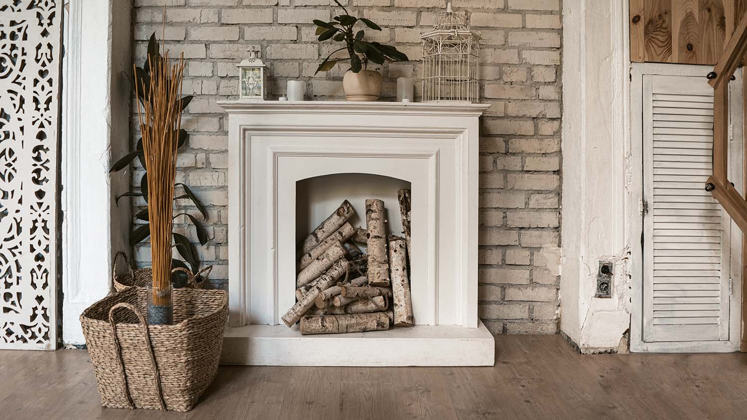 white fireplace storing logs