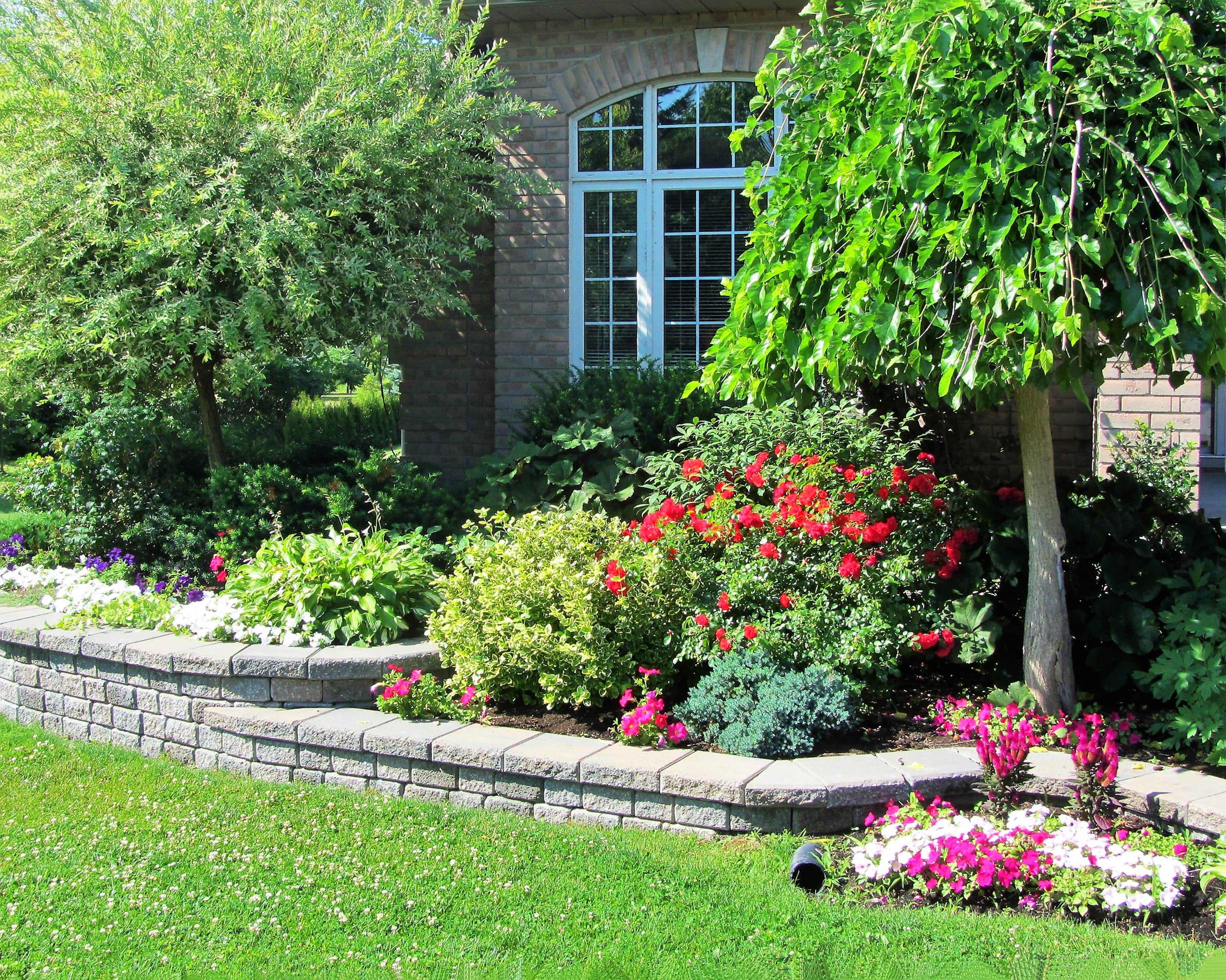 Flower bed in retaining wall