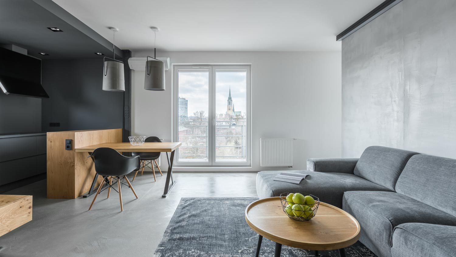 A gray living room with balcony