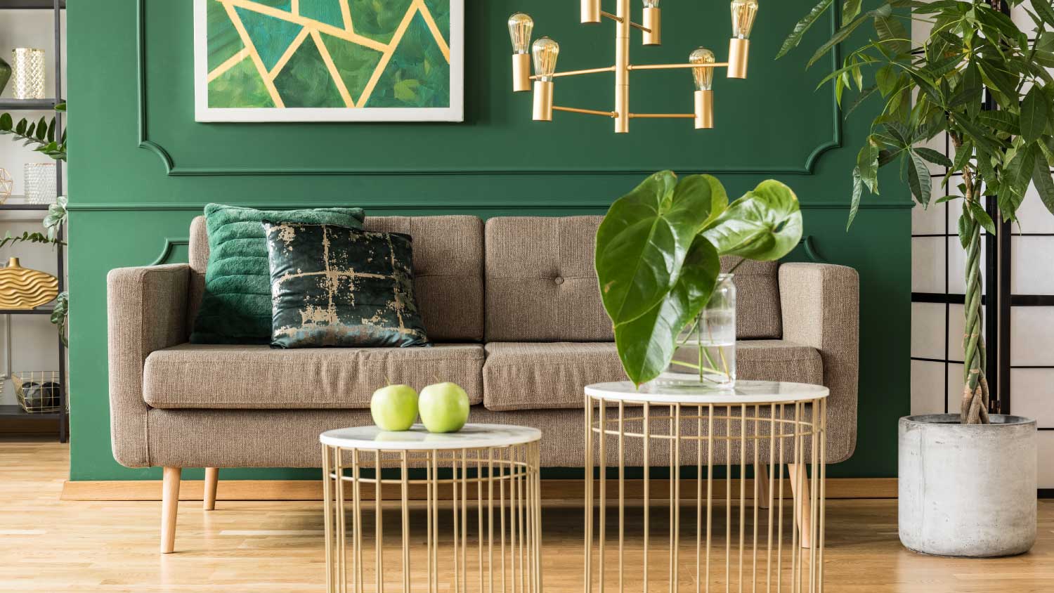 green living room with gold accents