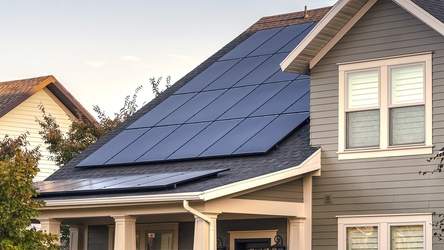 solar panel roof on grey house 