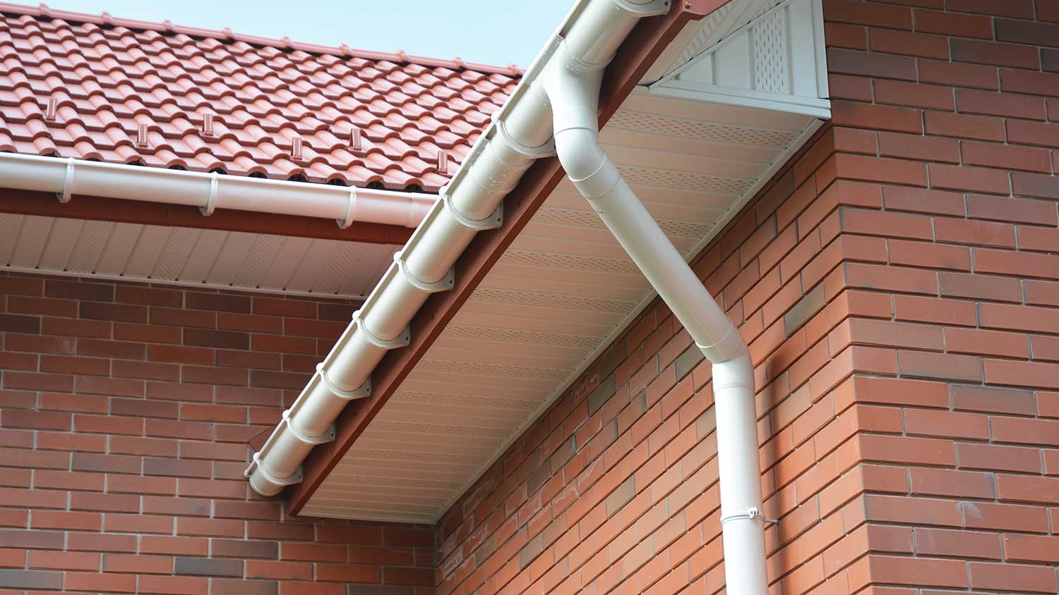 Downspout attached to a gutter