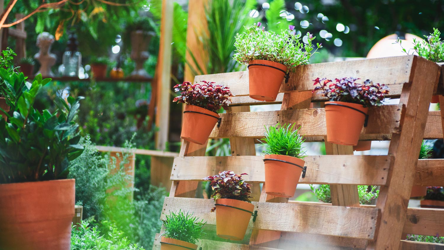 A hanging garden made from a pallet