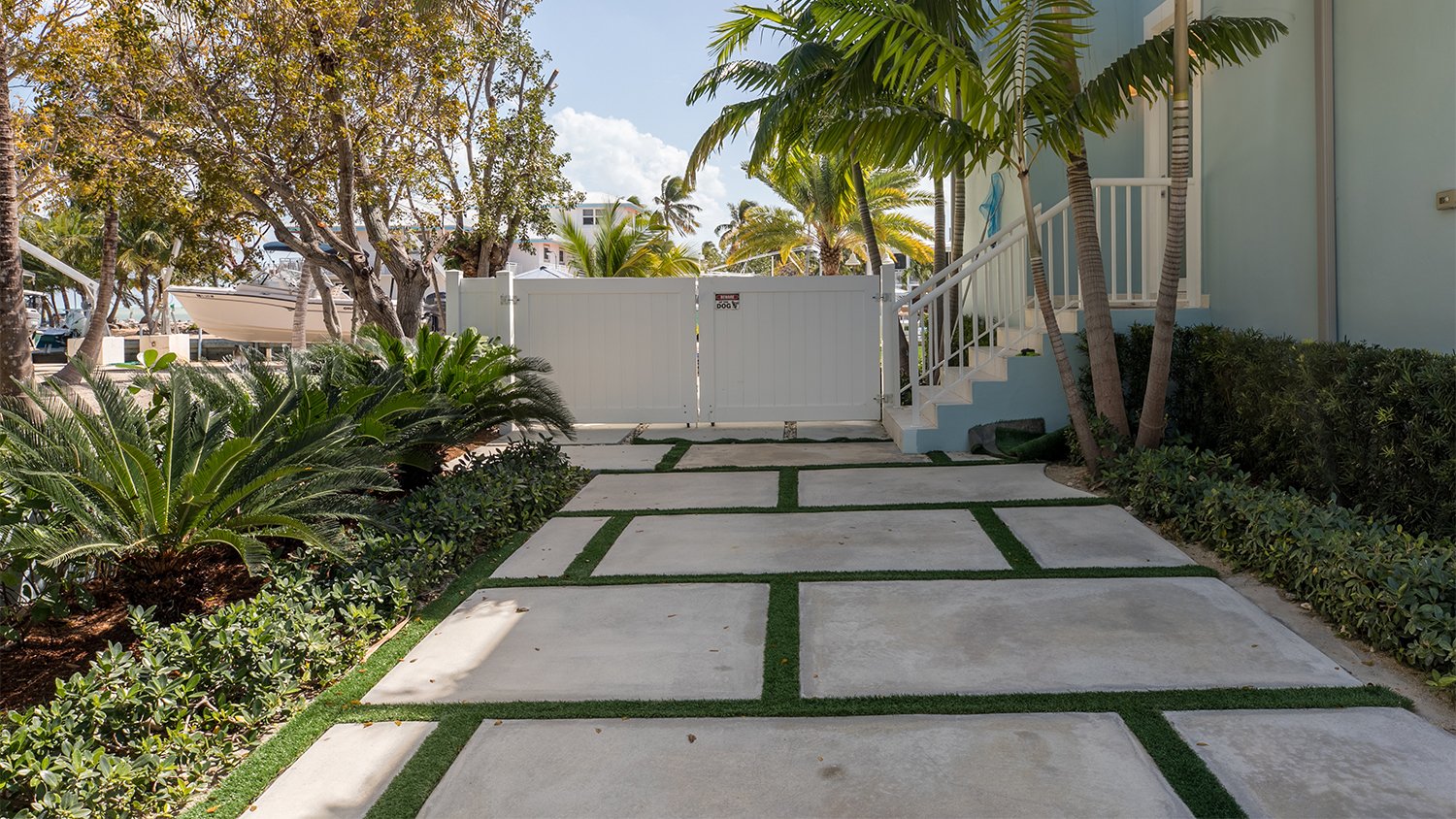 entrance with turf driveway   