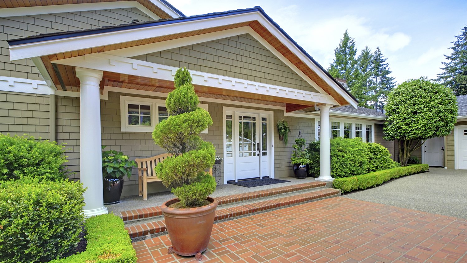 house with half basket weave paver  