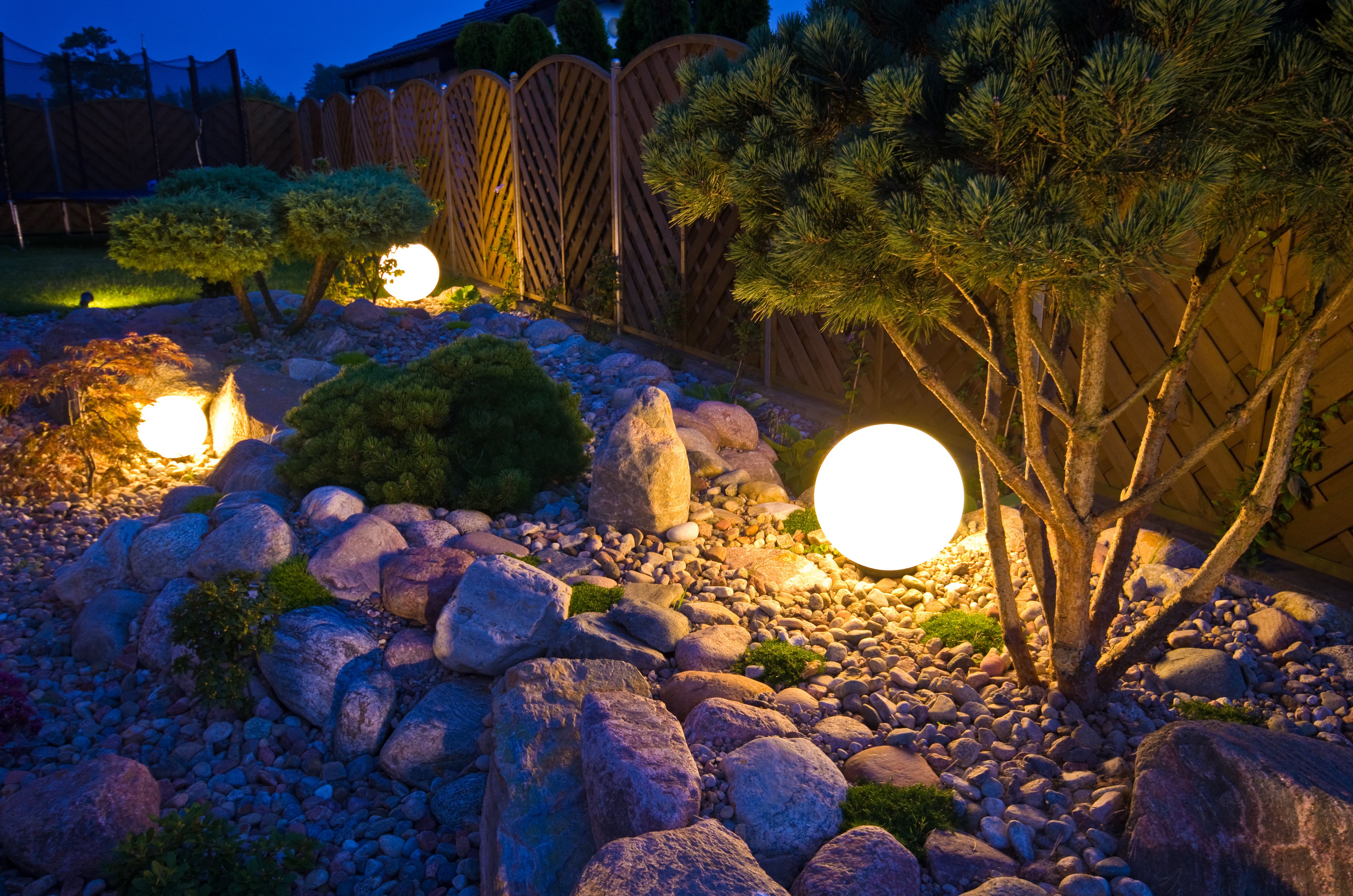 Globe lanterns in a rock garden