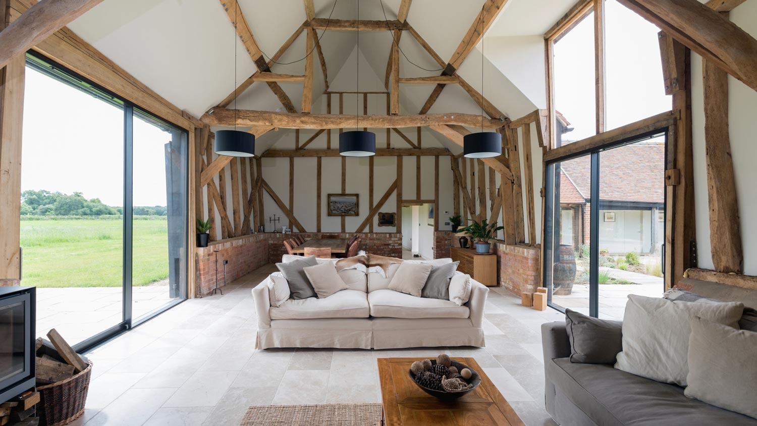 The interior of an open-space living room in a barn