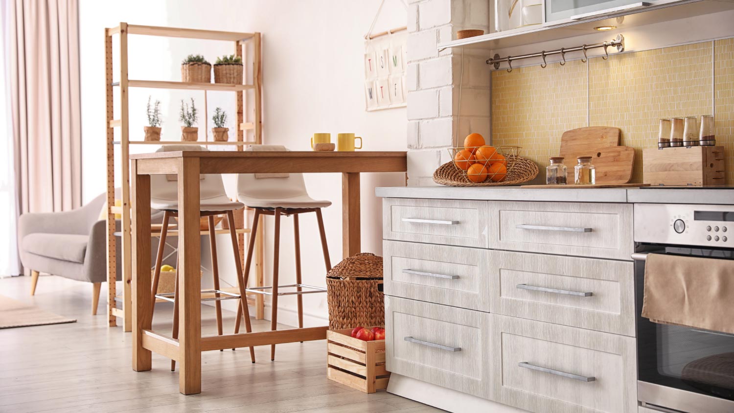 A modern kitchen interior with stylish wooden table