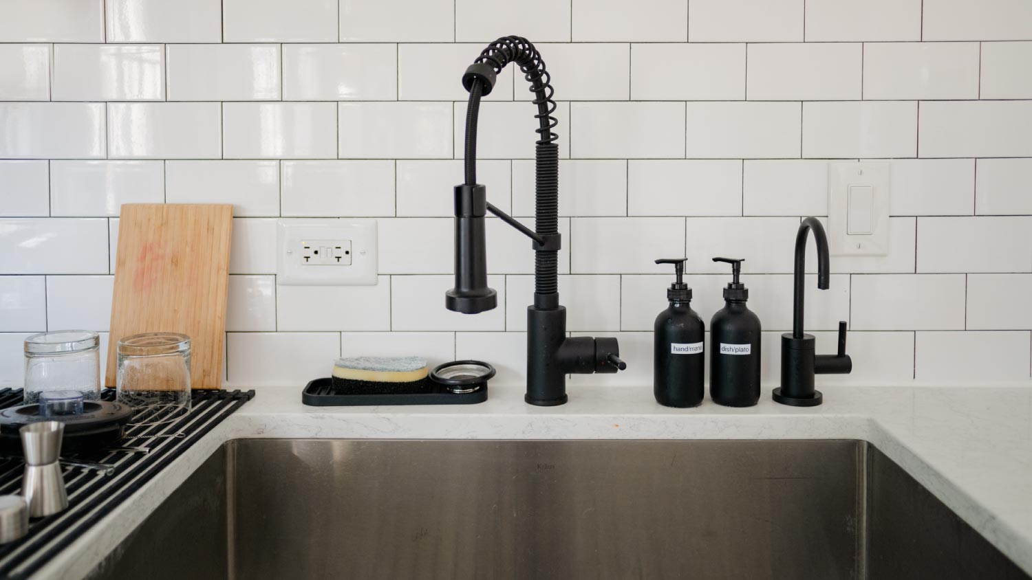 Kitchen sink with white subway tiles