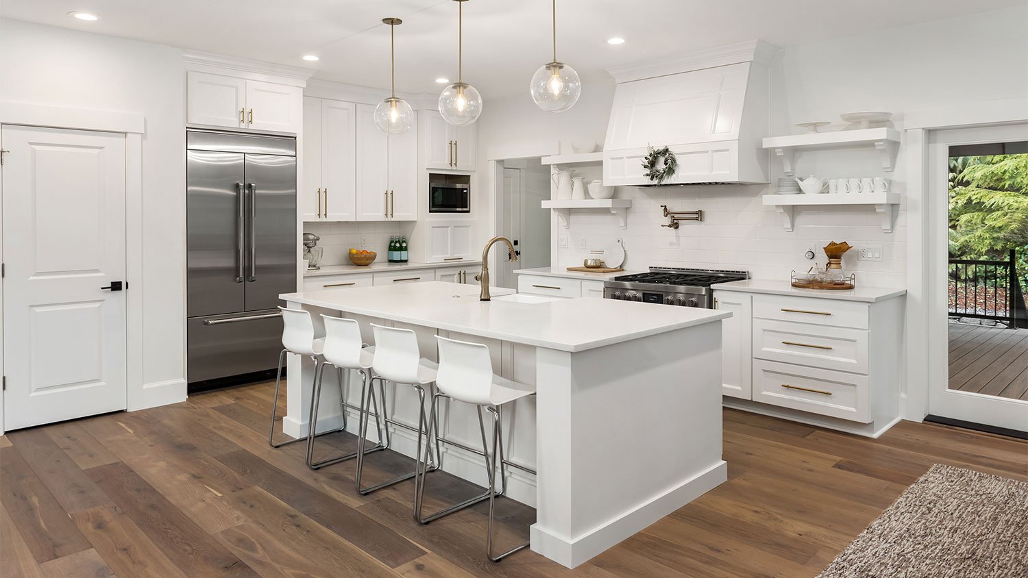 Kitchen with big island and pendant lights