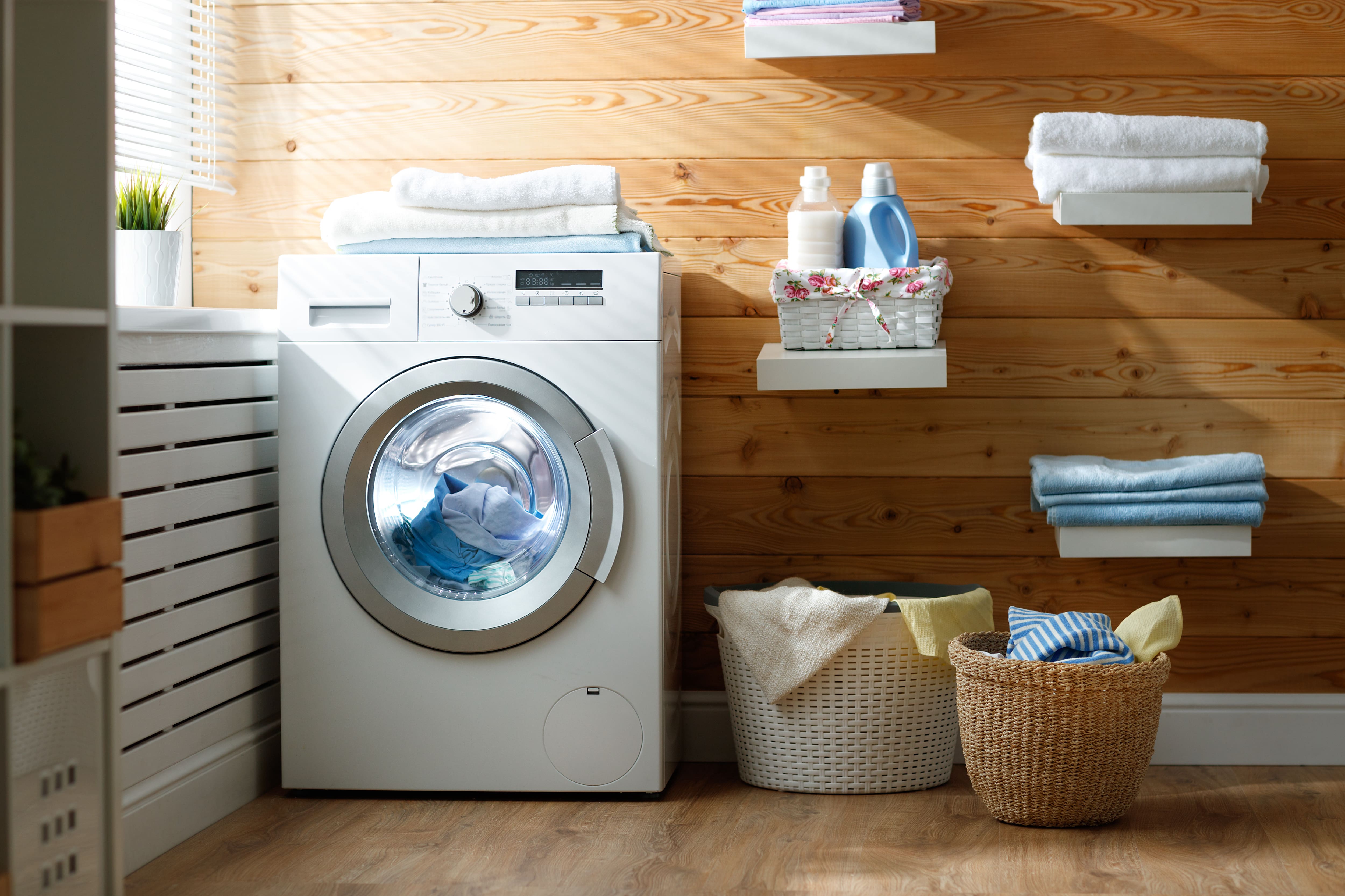 Floating shelves in the laundry room