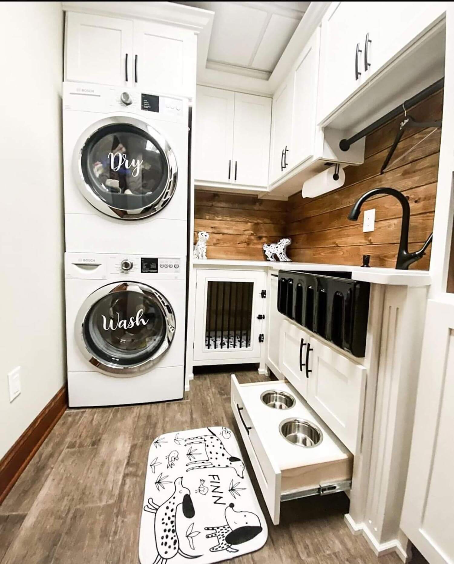 A laundry room with a drawer used as a feeding station