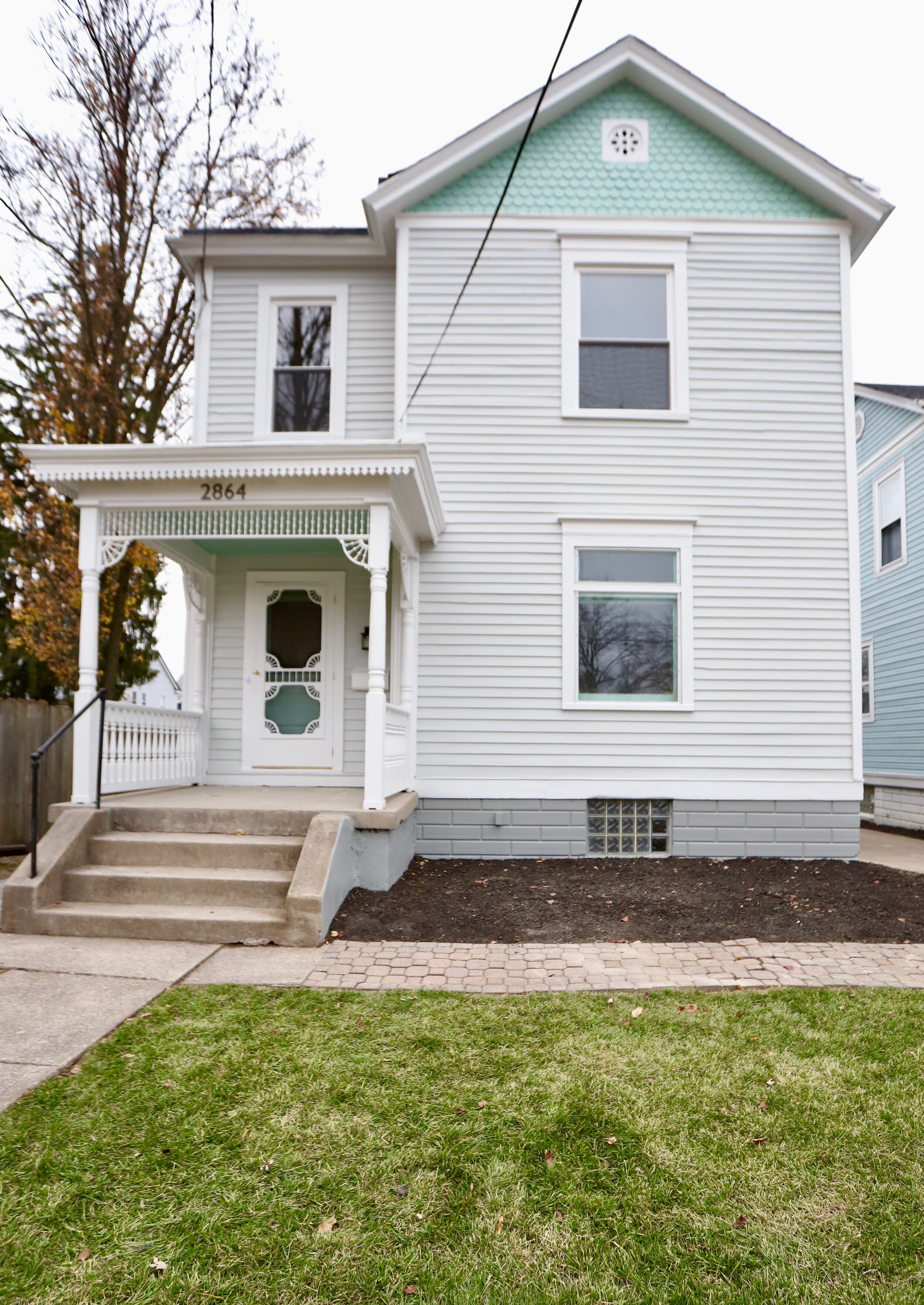 Light blue details on this Victorian house