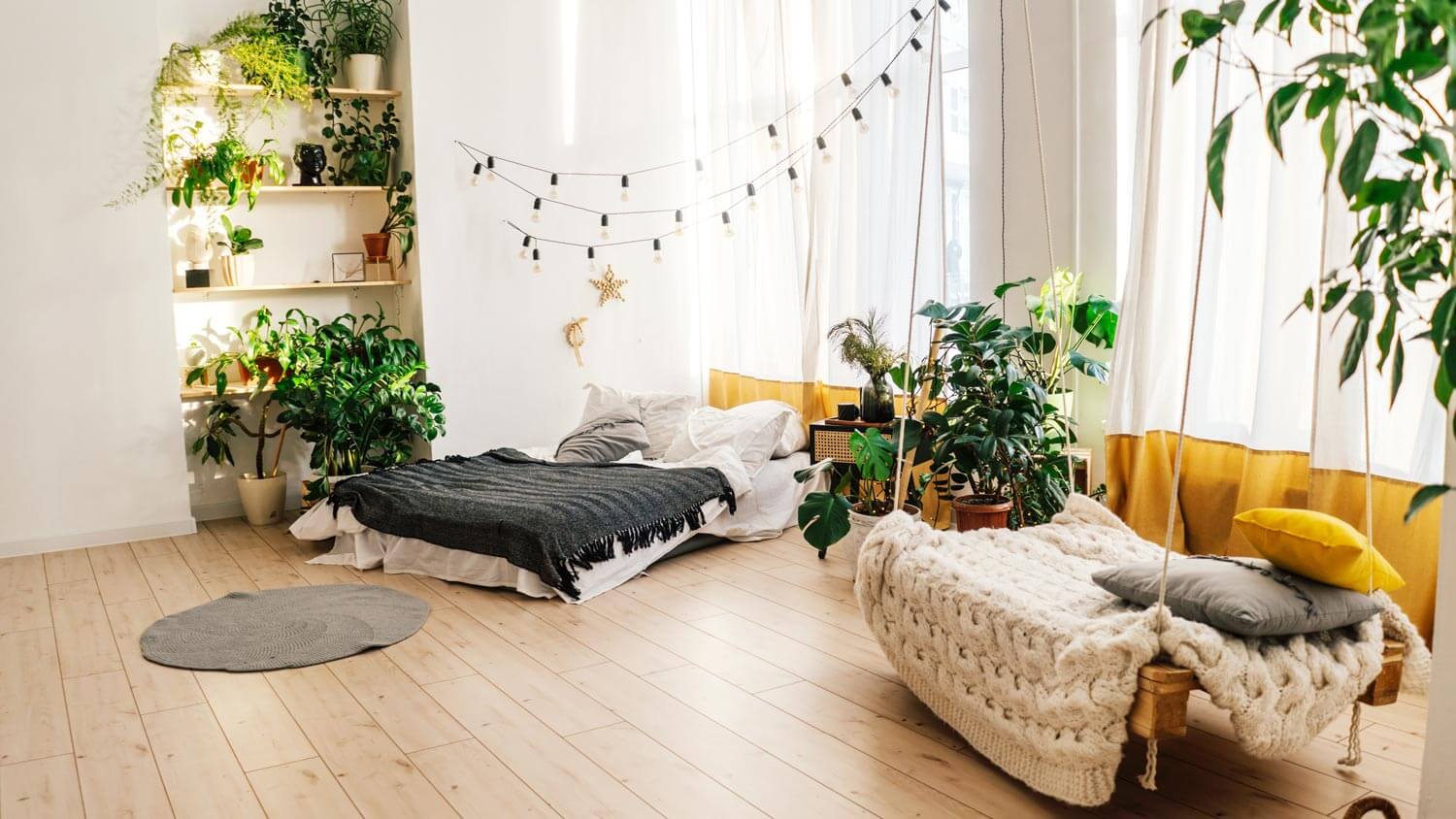 A light interior with sustainable design and green houseplants