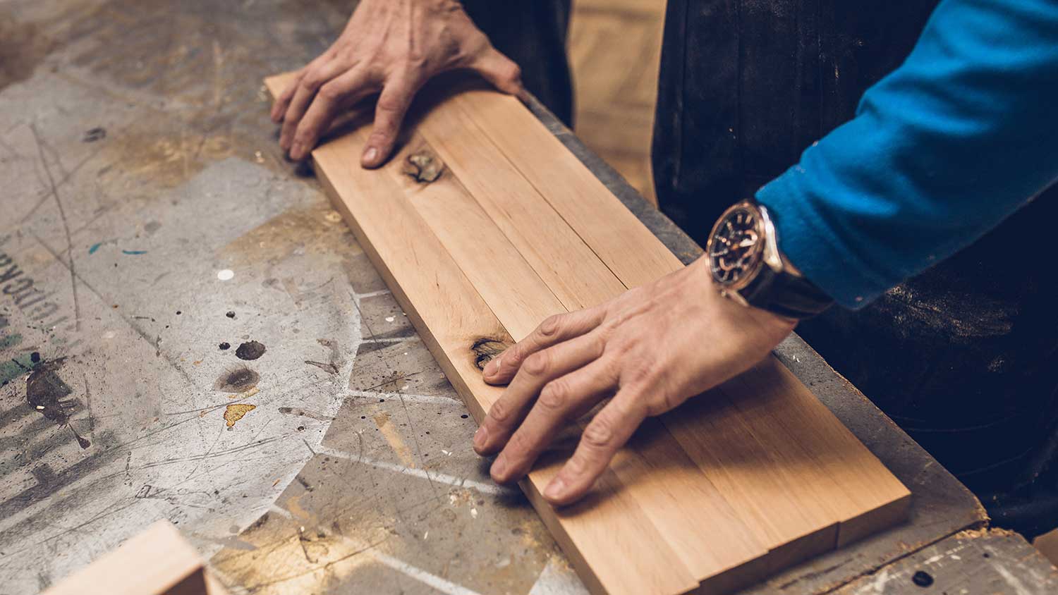 Carpenter lining up boards together