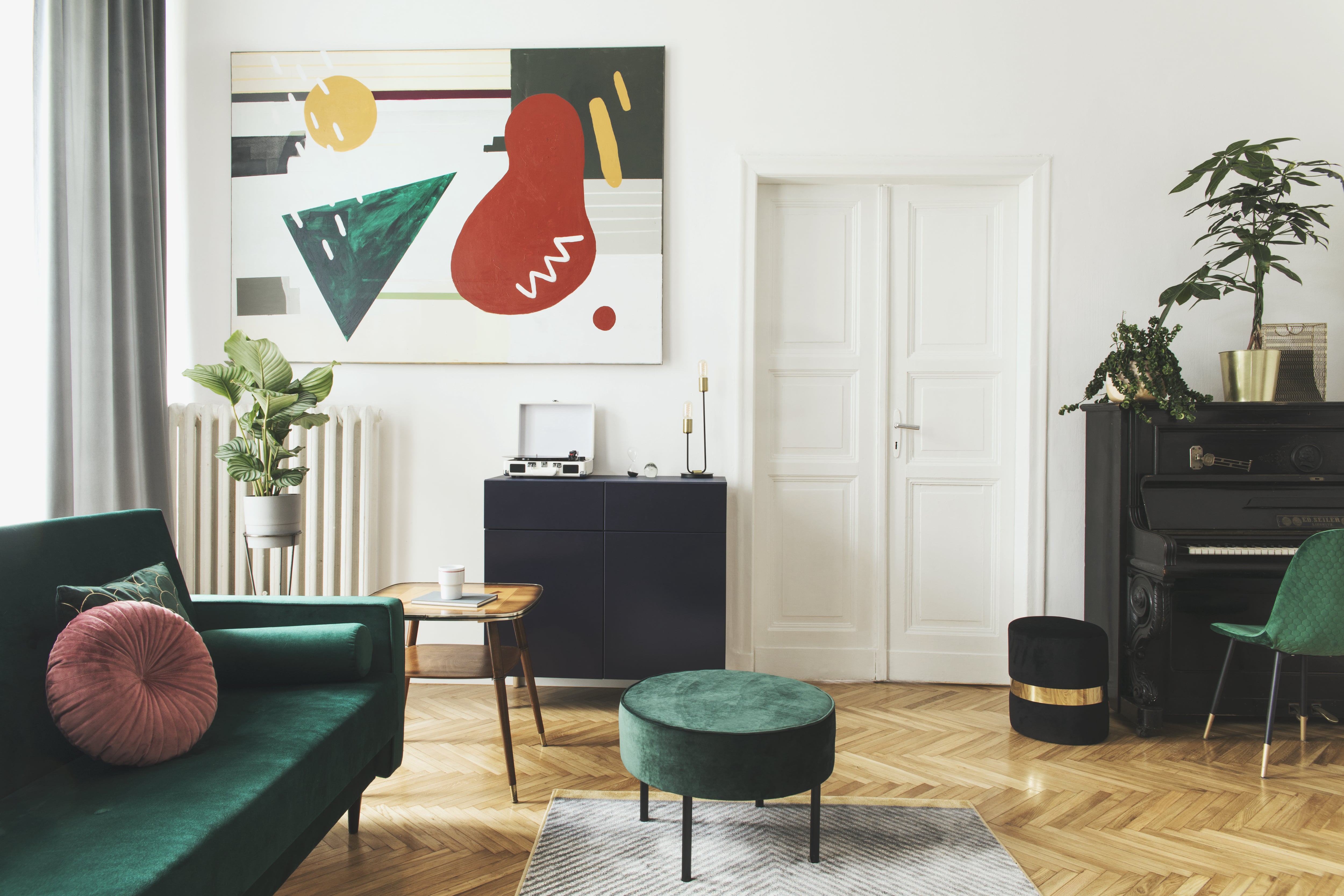 Living room with green velvet furniture