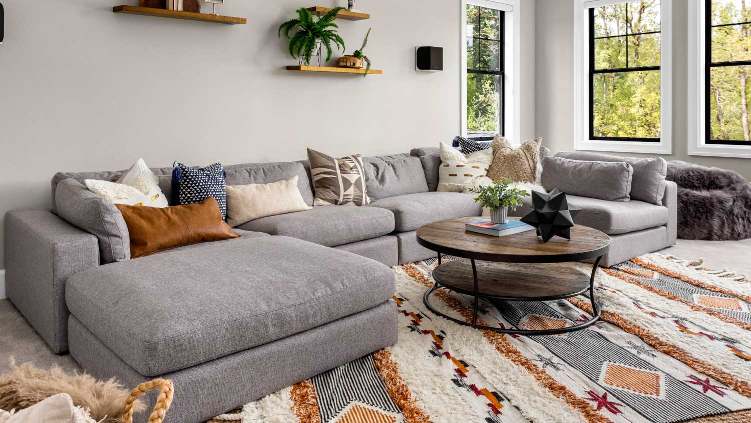 living room with layered rugs