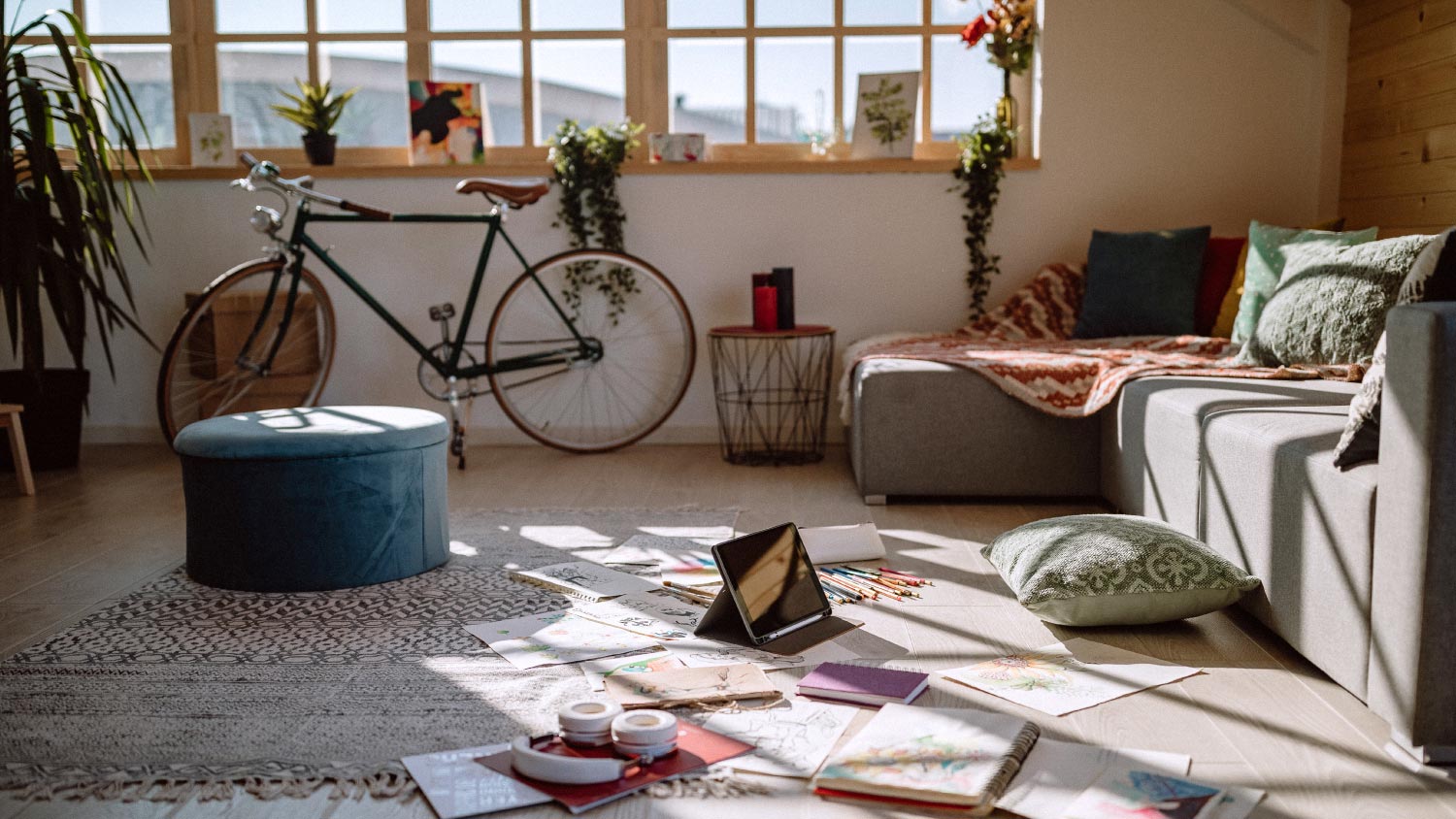 loft style living room with ottoman and bike